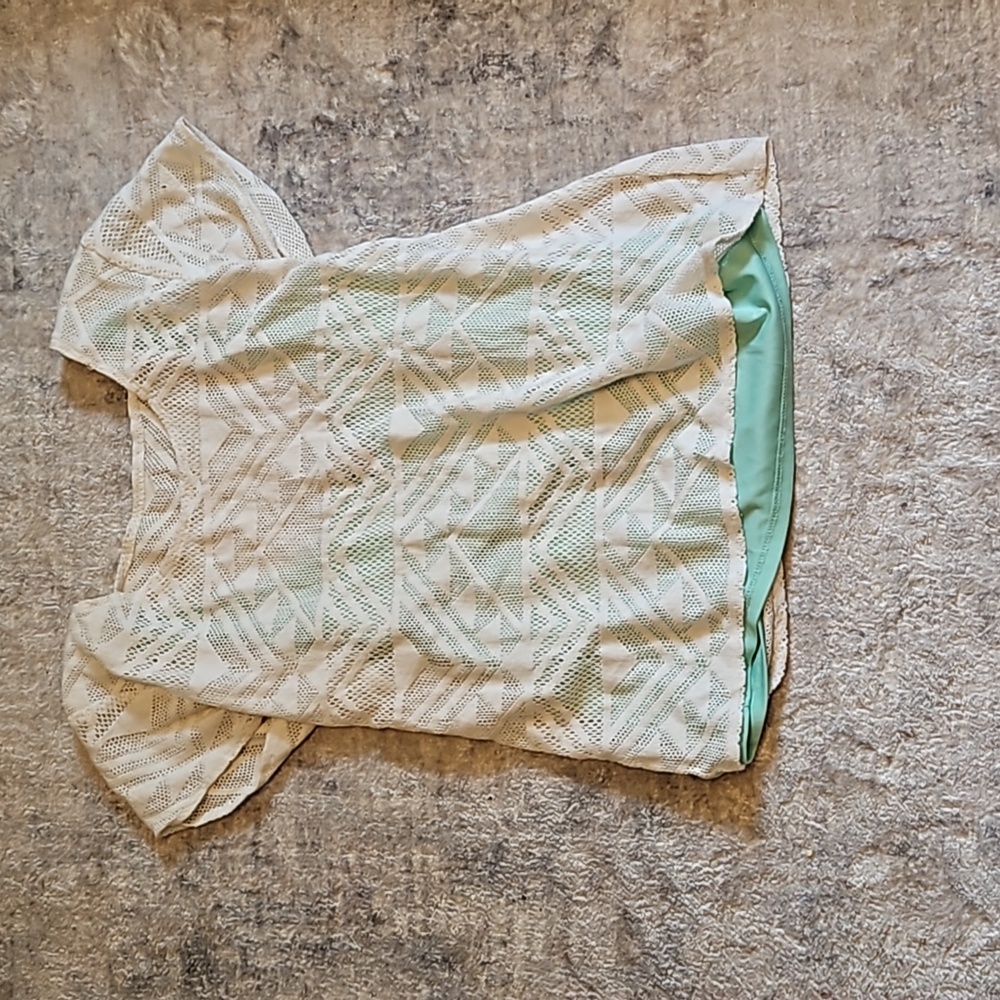 Cream blouse with mint under top